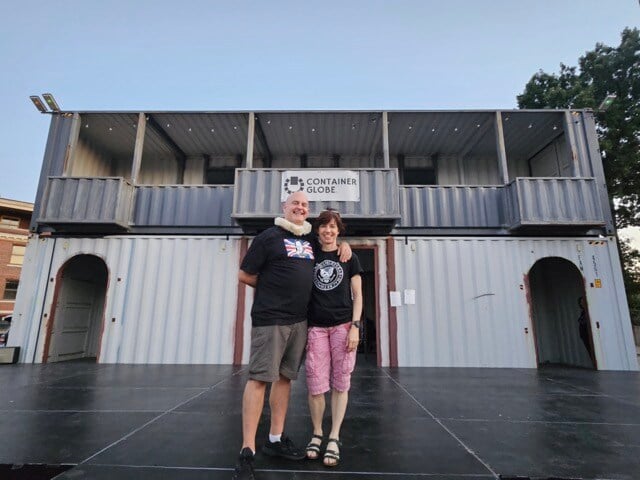 Globe Theater Owners in front of building