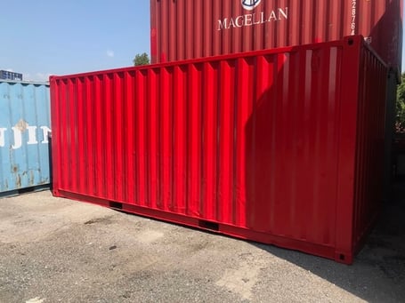bright red stacked shipping containers