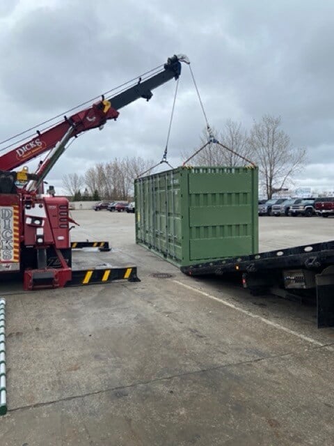 Rotator Truck lifting a container